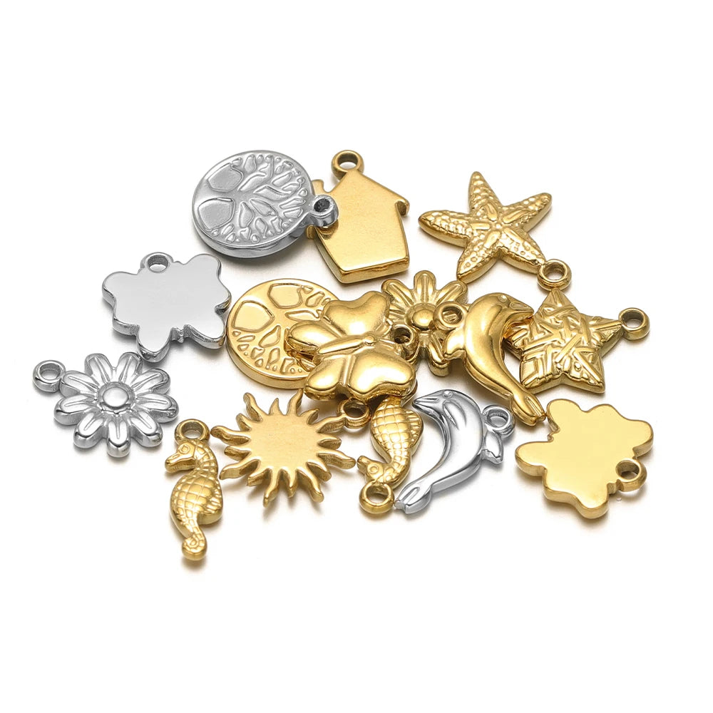 Gold and silver stainless steel animal charms, including sun and flower shapes