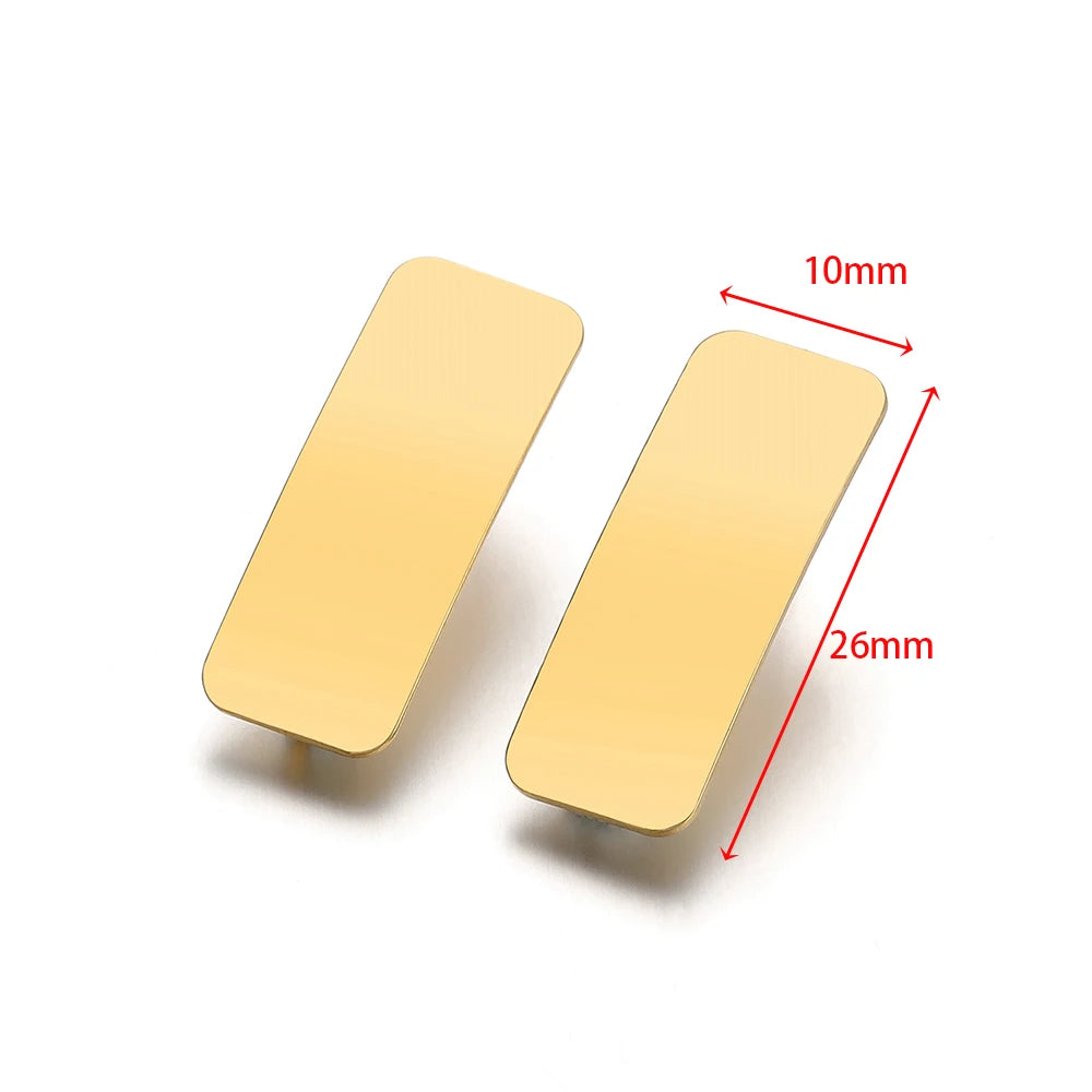Gold rectangular drop stud earrings, 26mm, flat embossed post design