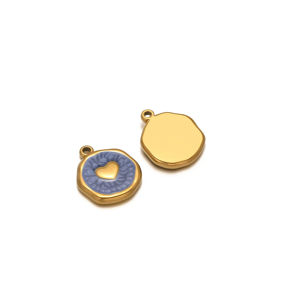 Enamel heart charm pendant with blue enamel and gold heart on round bezel