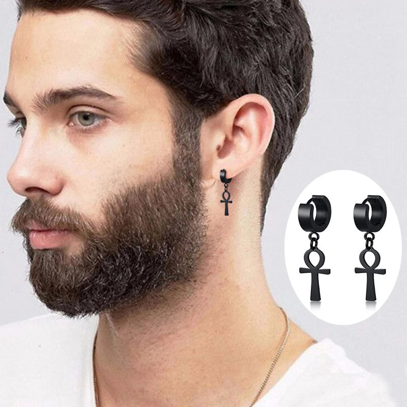 Black cross drop hoop earrings worn by a man