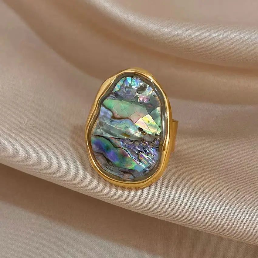 Gold-plated abalone shell chunky ring with iridescent oval stone in scalloped bezel