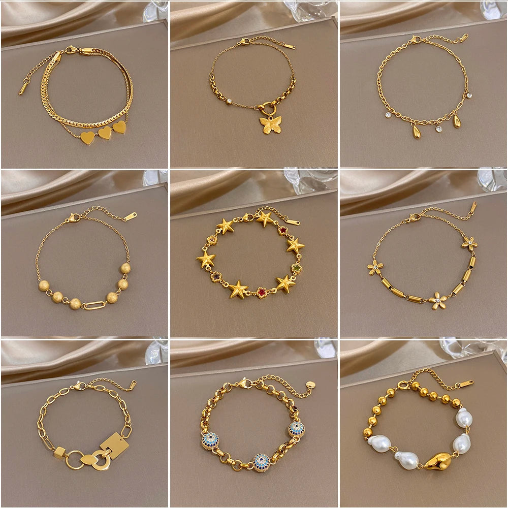 Gold-tone slim chain charm bracelets with heart and star motifs