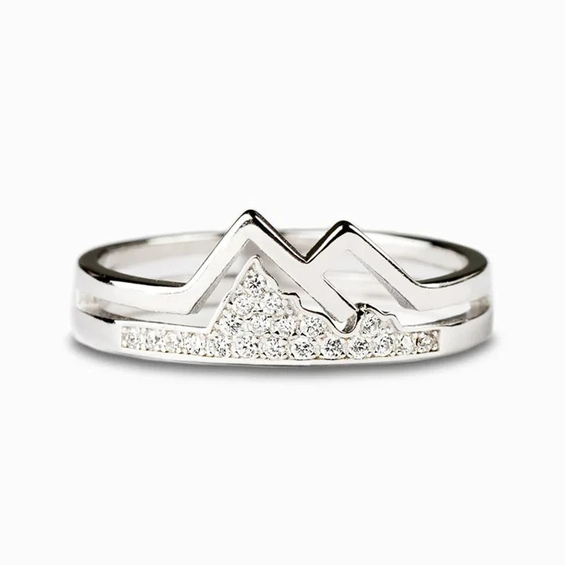Silver-tone mountain-shaped cubic zirconia ring, front view on white background