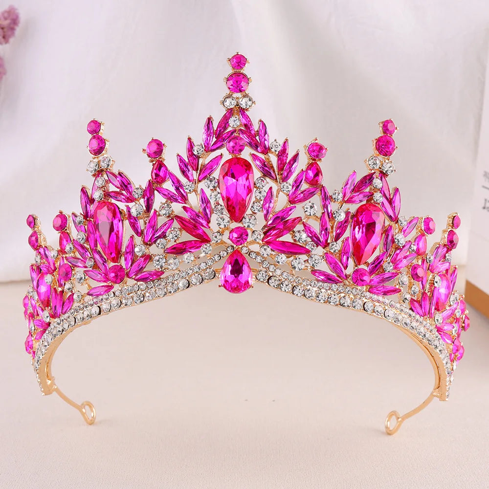 Pink crystal tiara headband with magenta stones, pointed leaf crown, and rhinestone band