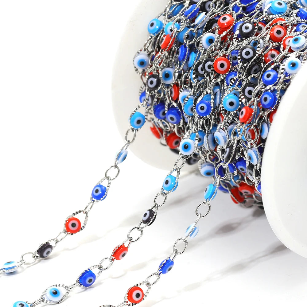 Evil eye bead chain with silver links and mixed blue and red eye charms