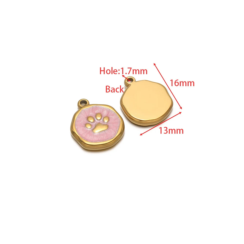 Enamel charm pendant pair: gold blank disc and pink paw print with metal loop