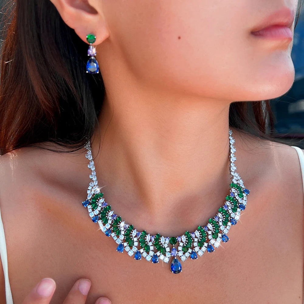 Silver-tone multicolor zircon necklace and drop earring set, worn with green and blue stones