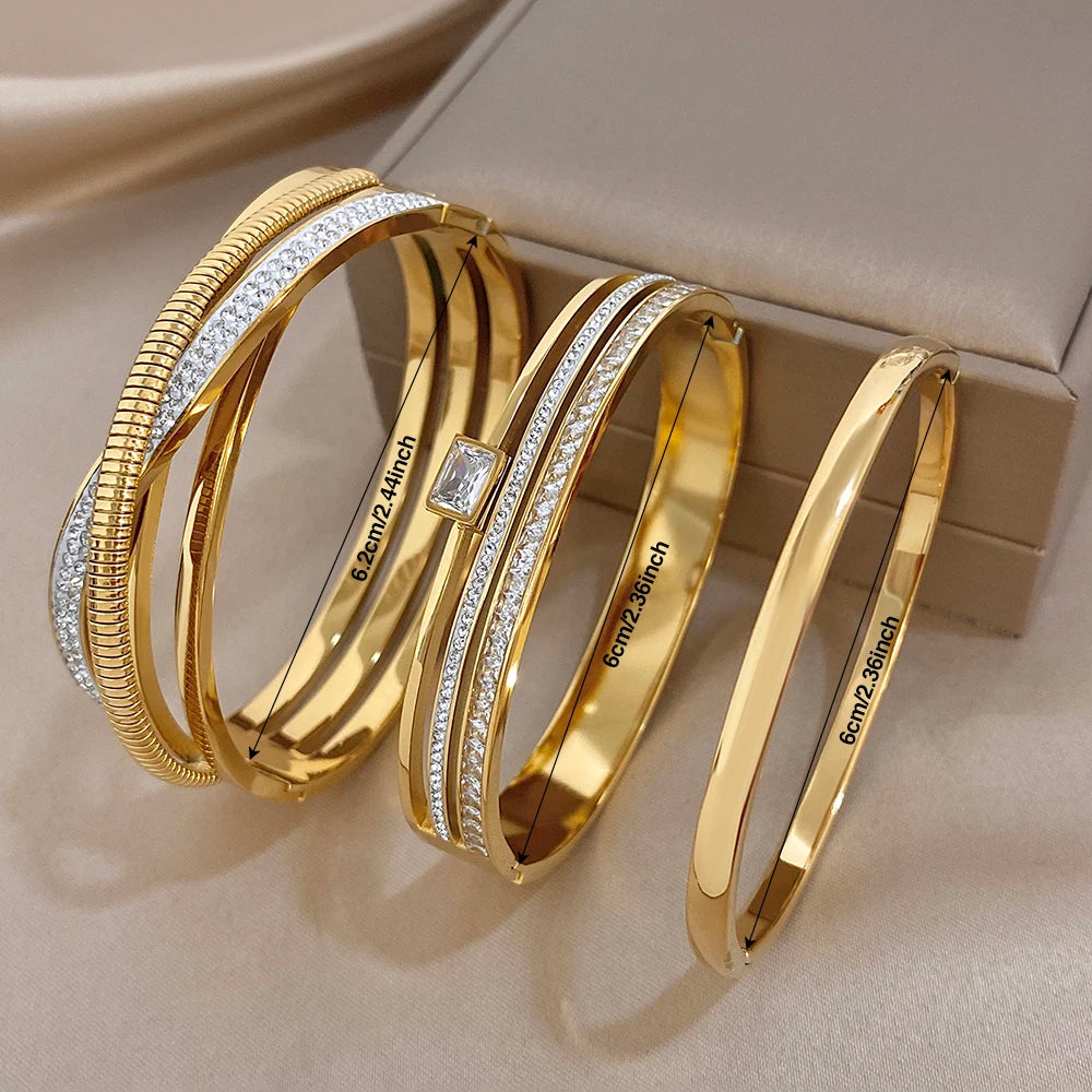 Gold-plated stainless steel cuff bangles with zircon accents