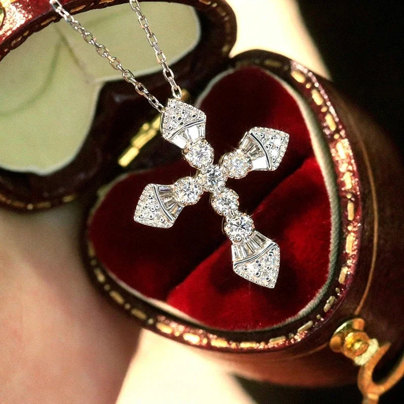 Faceted crystal cross pendant necklace with sparkle stones on a chain