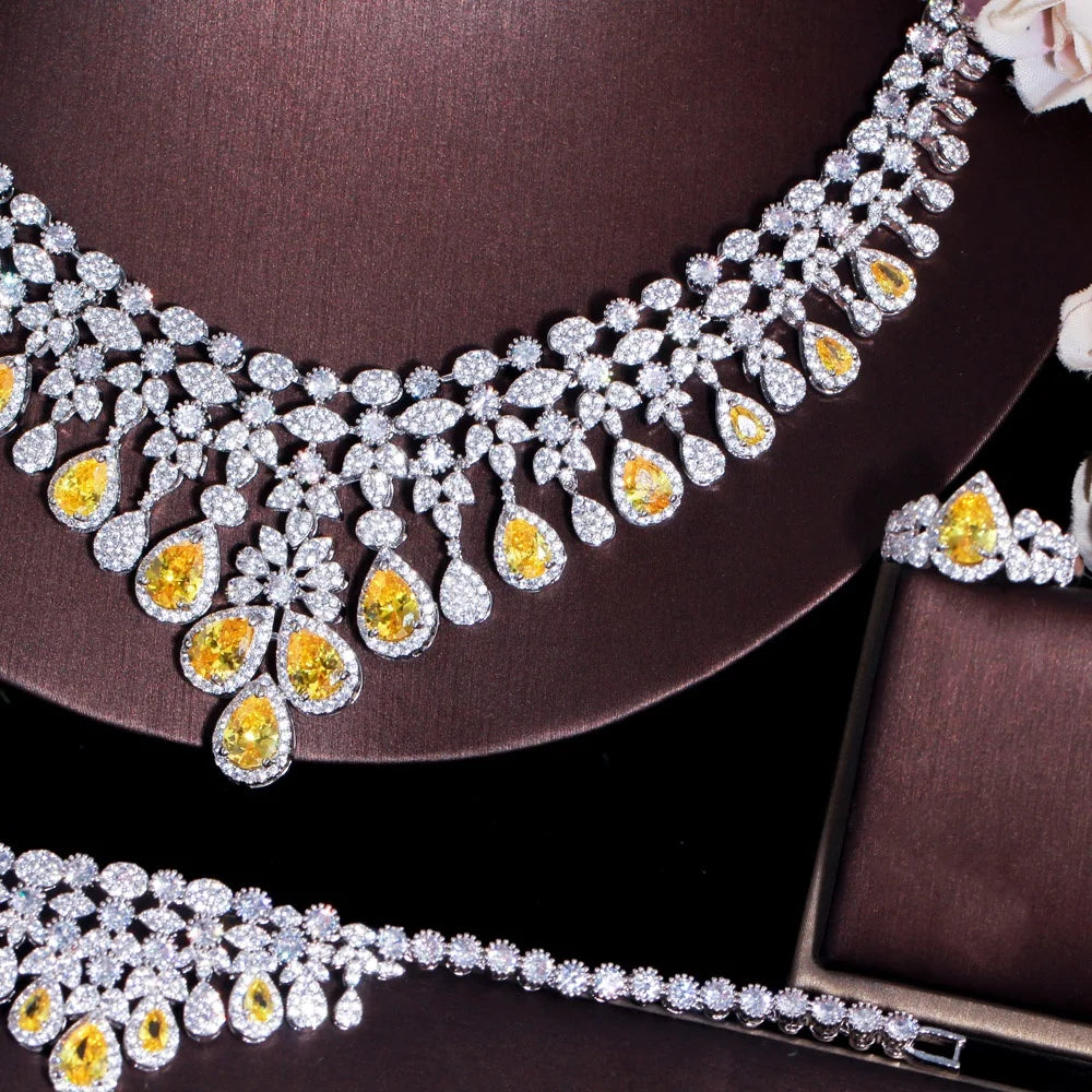 Sparkling teardrop crystal collar necklace with yellow center accents, silver-tone setting