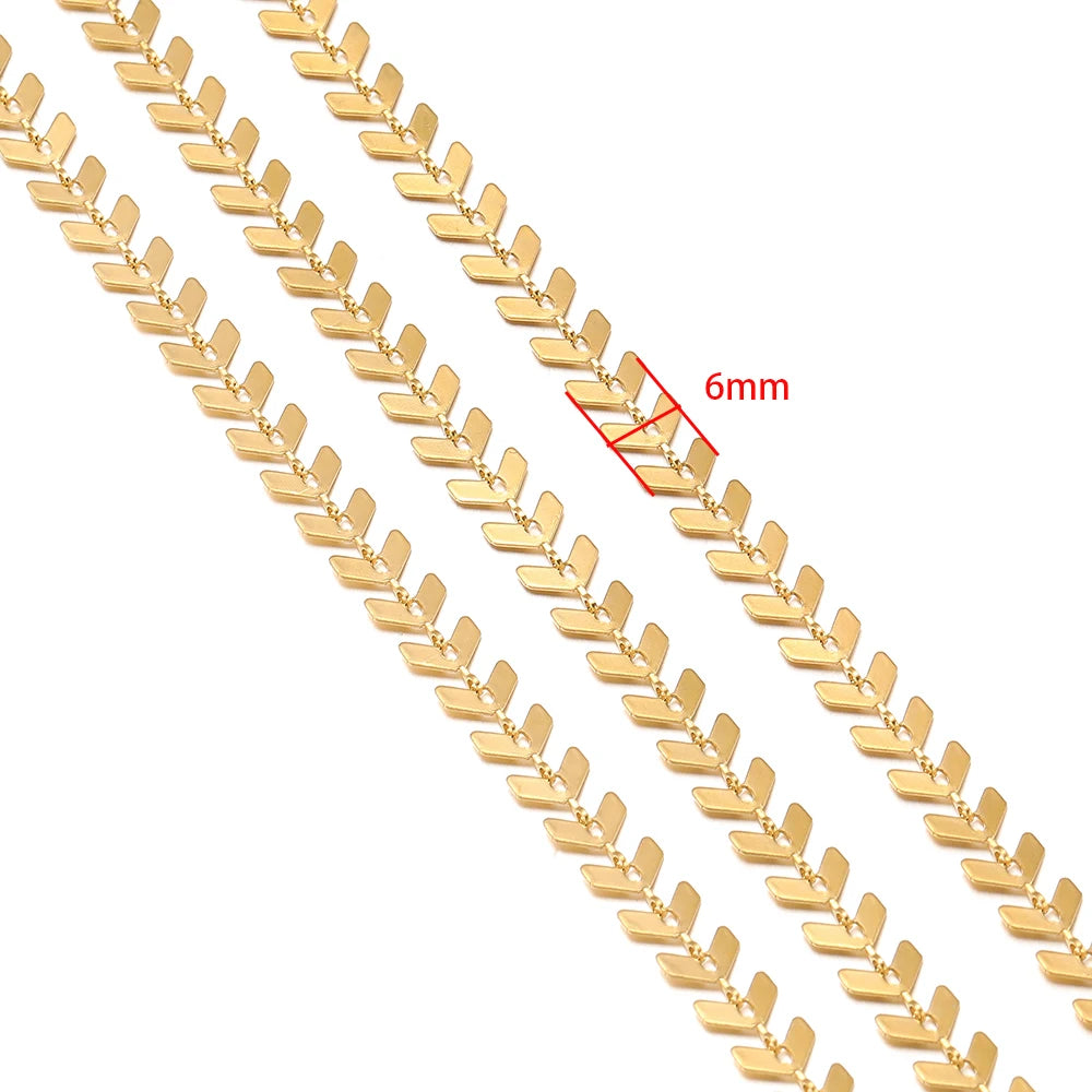 Gold airplane arrow chain with 6mm link width shown for sizing