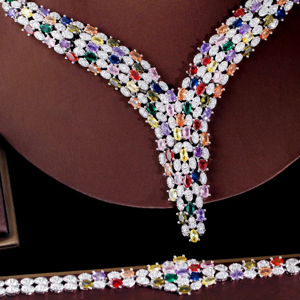 Multicolor cubic zirconia V-necklace with bracelet detail in bright gemstone colors