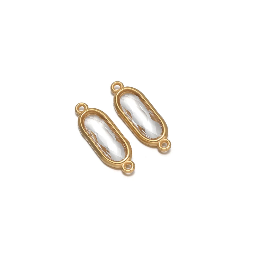 Oval glass charm connectors, clear white glass in gold bezels, with hanging loops