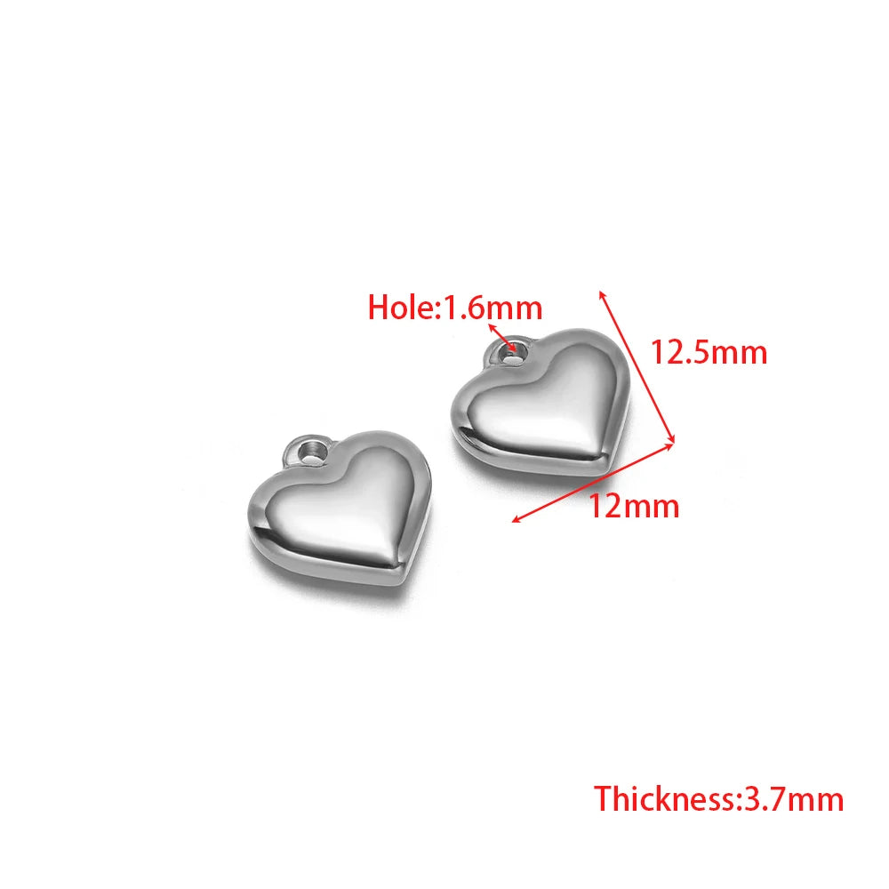 Silver heart-shaped pendant charm with small loop bail for DIY jewelry making