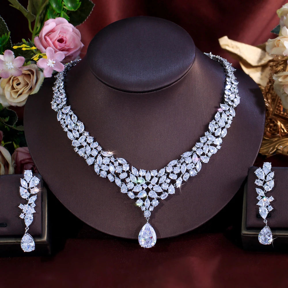 Silver-tone CZ necklace and drop earrings with a V-shaped floral design