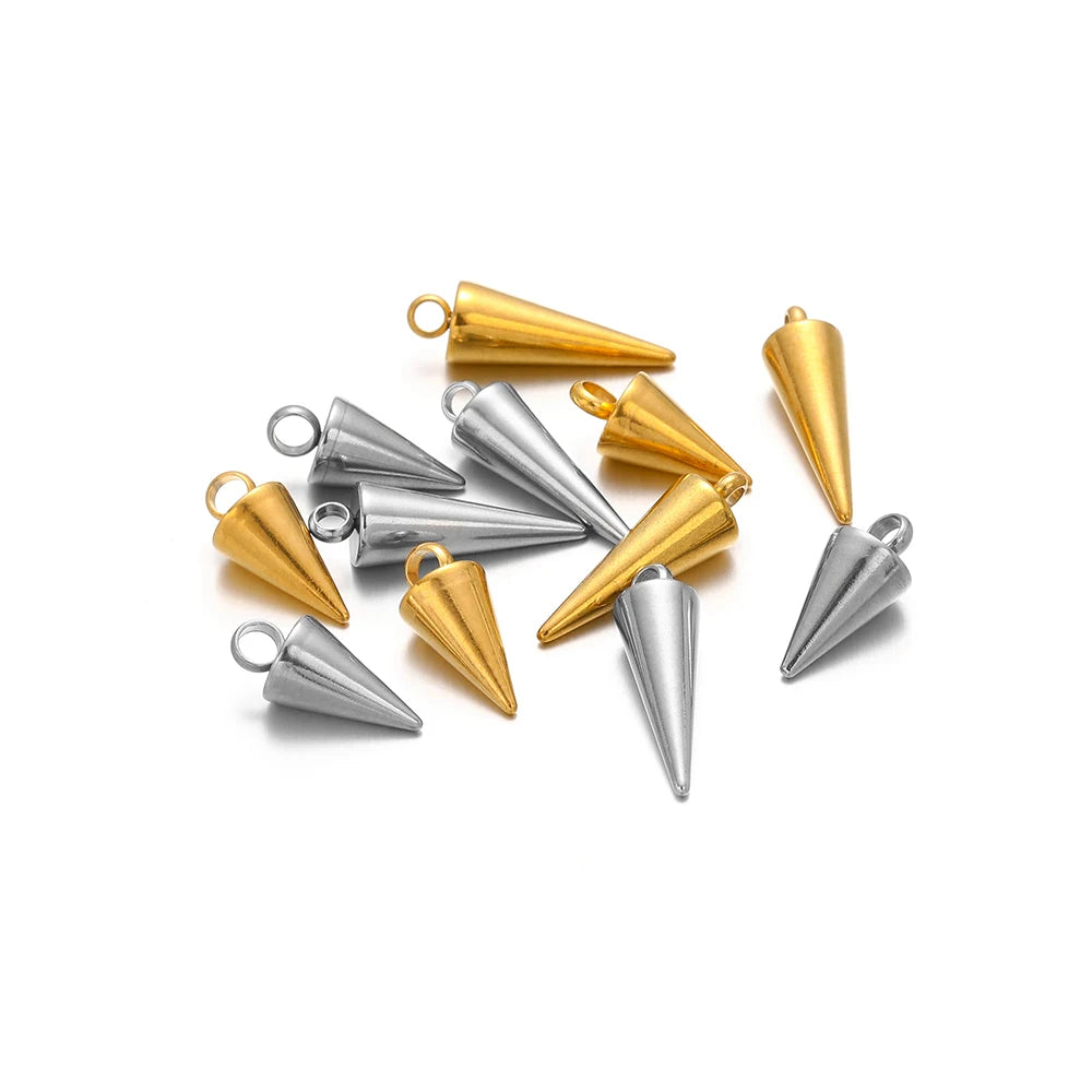Gold and silver cone charms with ring loops, scattered 10-piece set