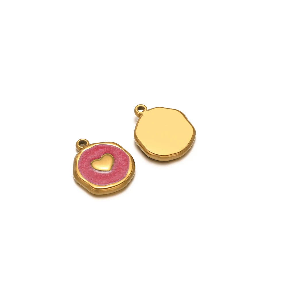 Evil eye charm pendants: pink-red enamel heart icon with gold border and plain gold drop charm