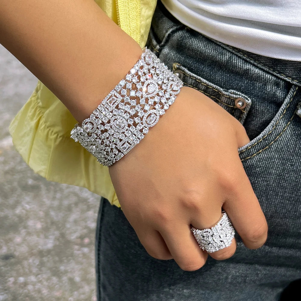 Cubic zirconia cuff bangle and matching ring set with floral cluster design