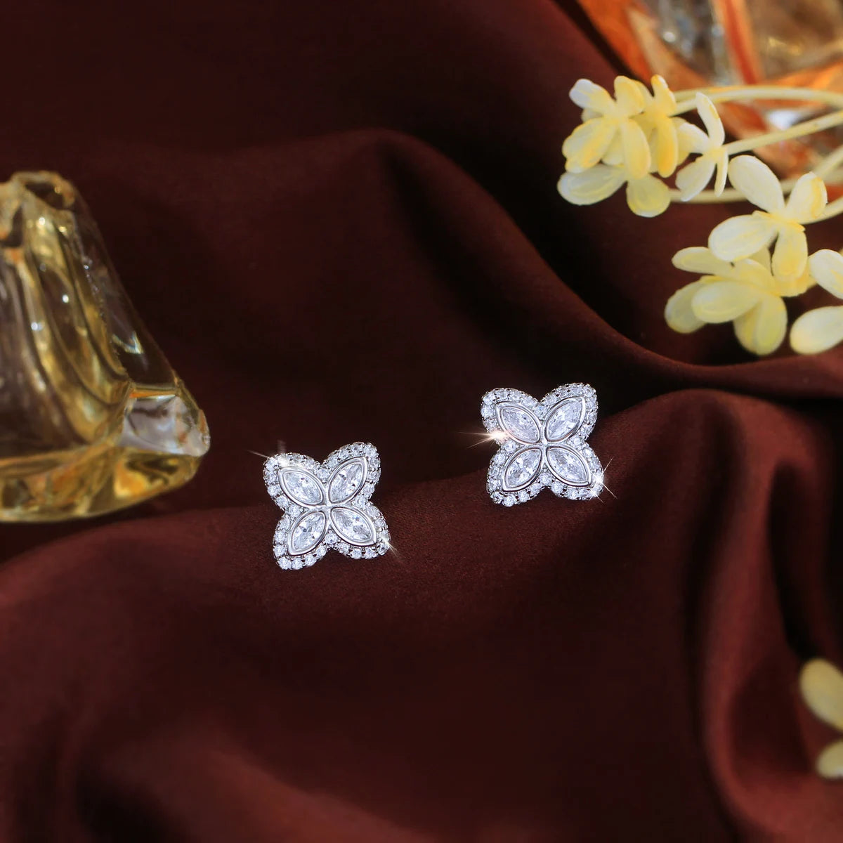 Pair of four-leaf stud earrings with clear stones
