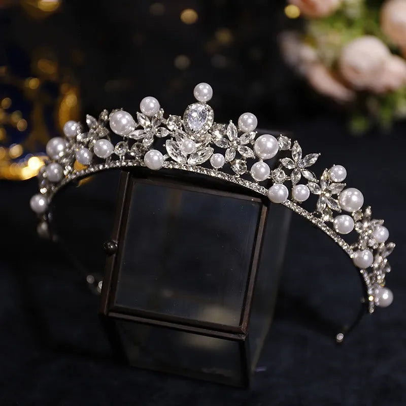 Silver bridal tiara with pearl accents and rhinestone flowers; square crystal center