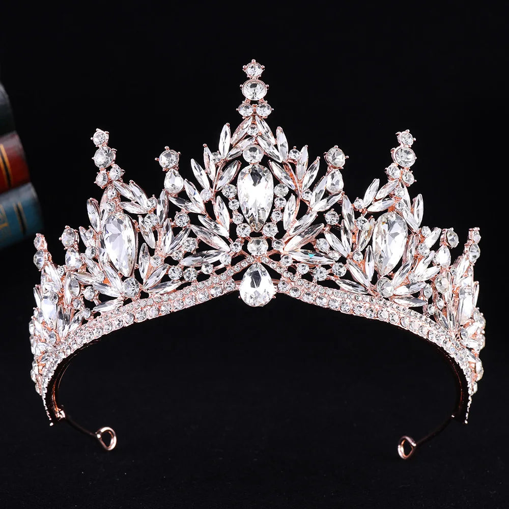 Silver crystal teardrop tiara crown with pink-tinged gems and rhinestone band