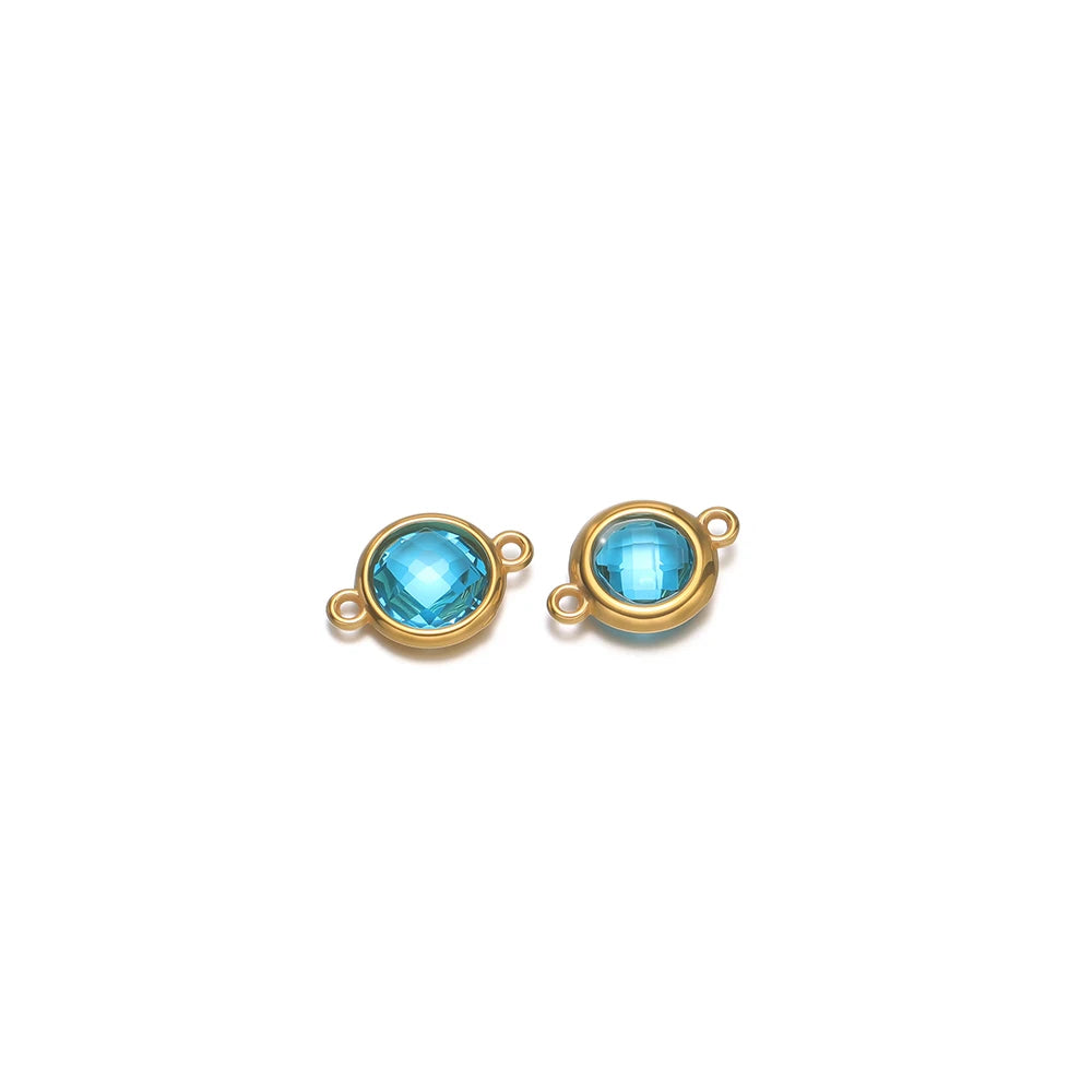 Blue round faceted glass charm pendants with gold-tone loops, pair view