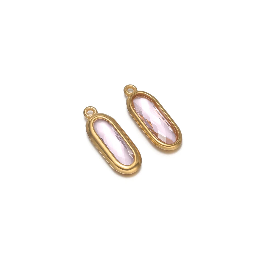 Oval glass charm connectors, pink glass in gold bezels, with hanging loops