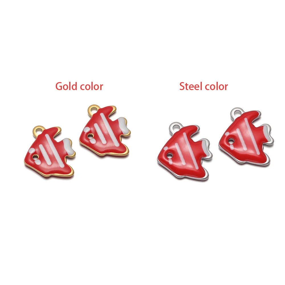 Red fish-shaped charm set with loop, gold-tone and silver-tone finishes.