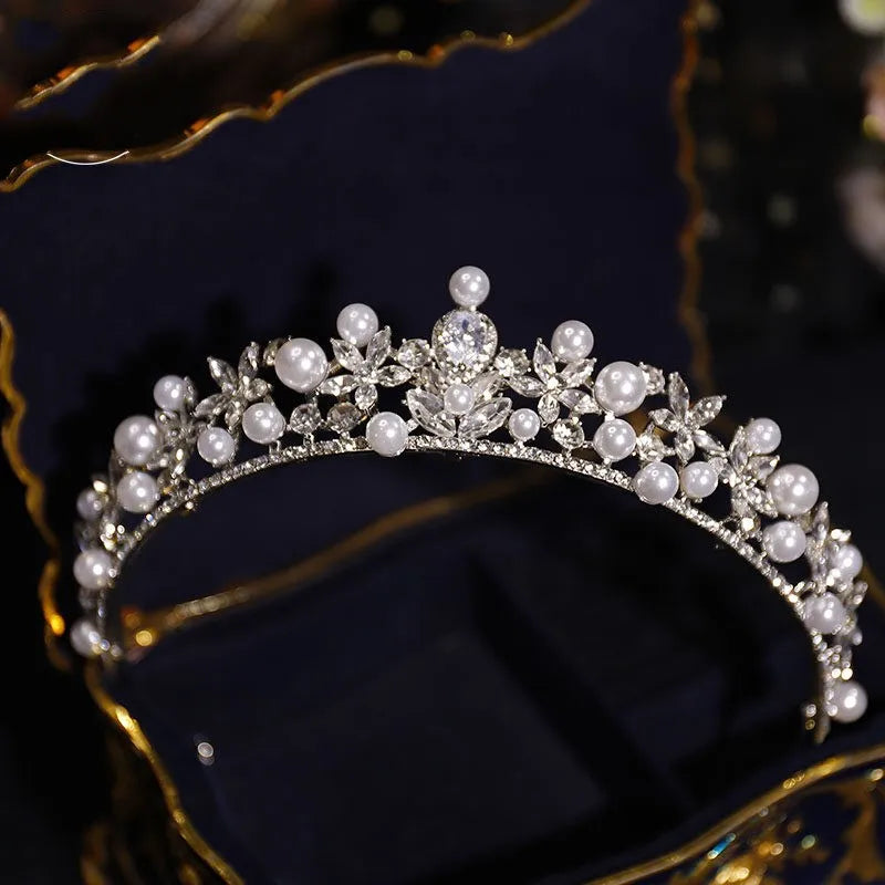 Silver bridal tiara crown with pearl beads and sparkling rhinestone floral cluster