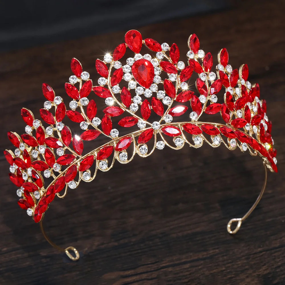 Red crystal leaf-branch tiara with teardrop stones, silver accents, and arched headband