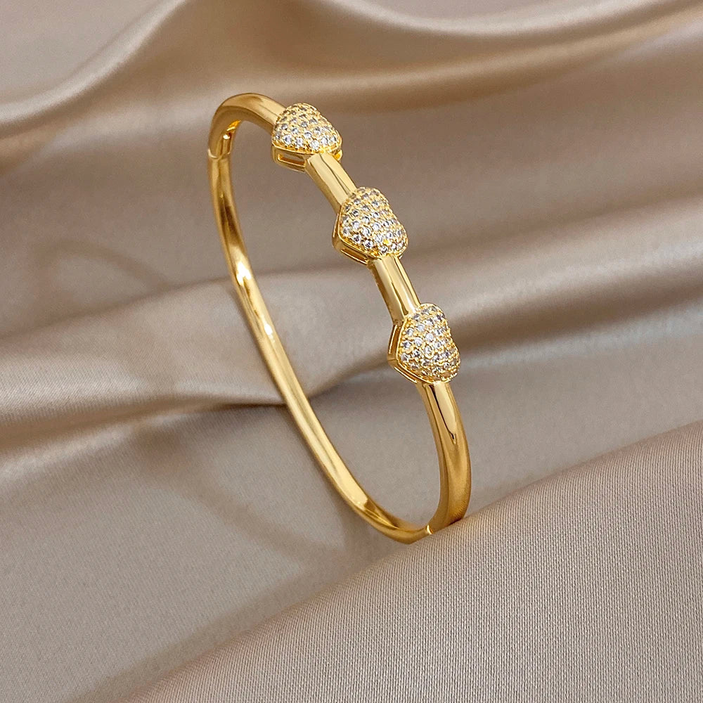 Gold-tone zircon geometric cuff bracelet with oval round pave stations