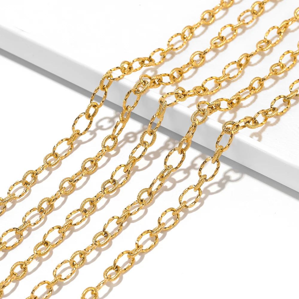 Gold stainless steel rolo cable chain with oval links, 7mm width