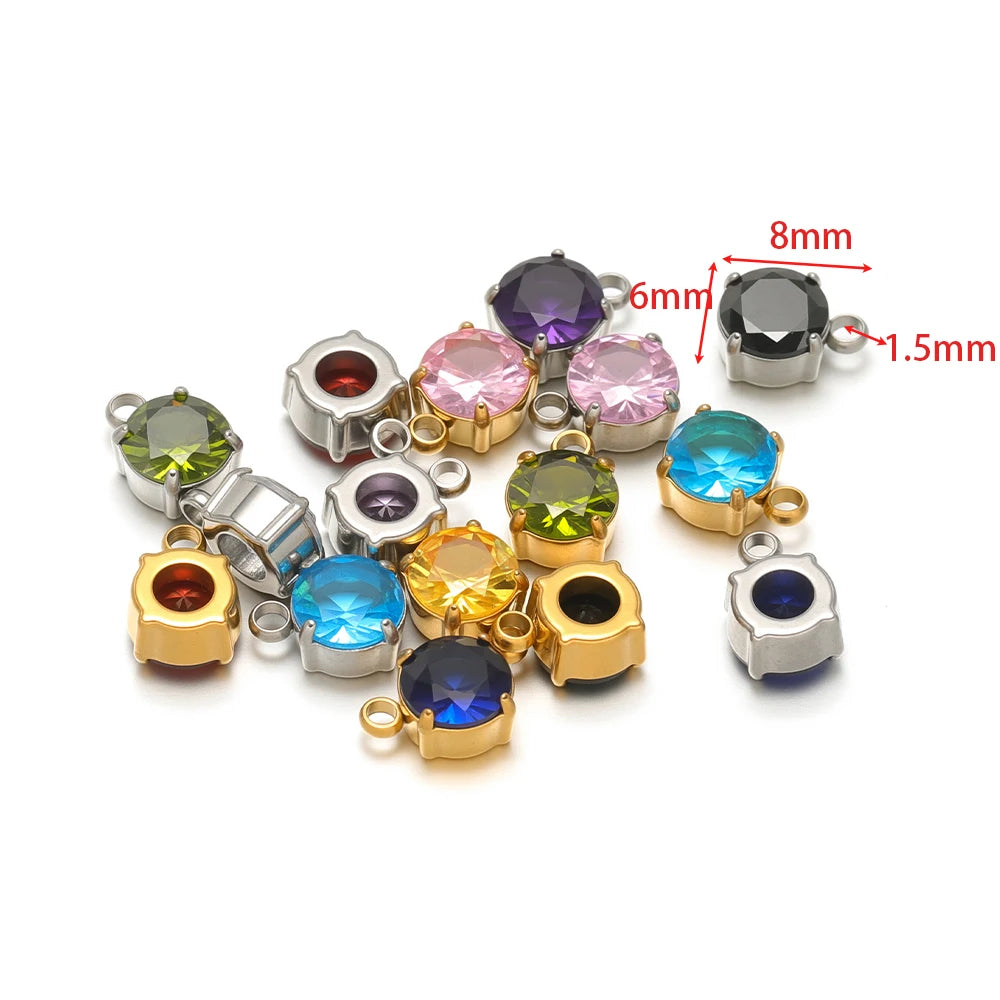 Assorted round glass crystal sewing claws with gold and silver settings and colorful stones