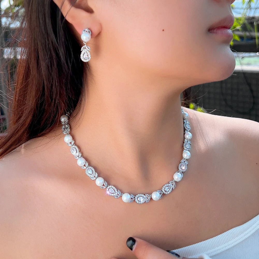 White-tone cubic zirconia and pearl bead necklace with matching drop earrings