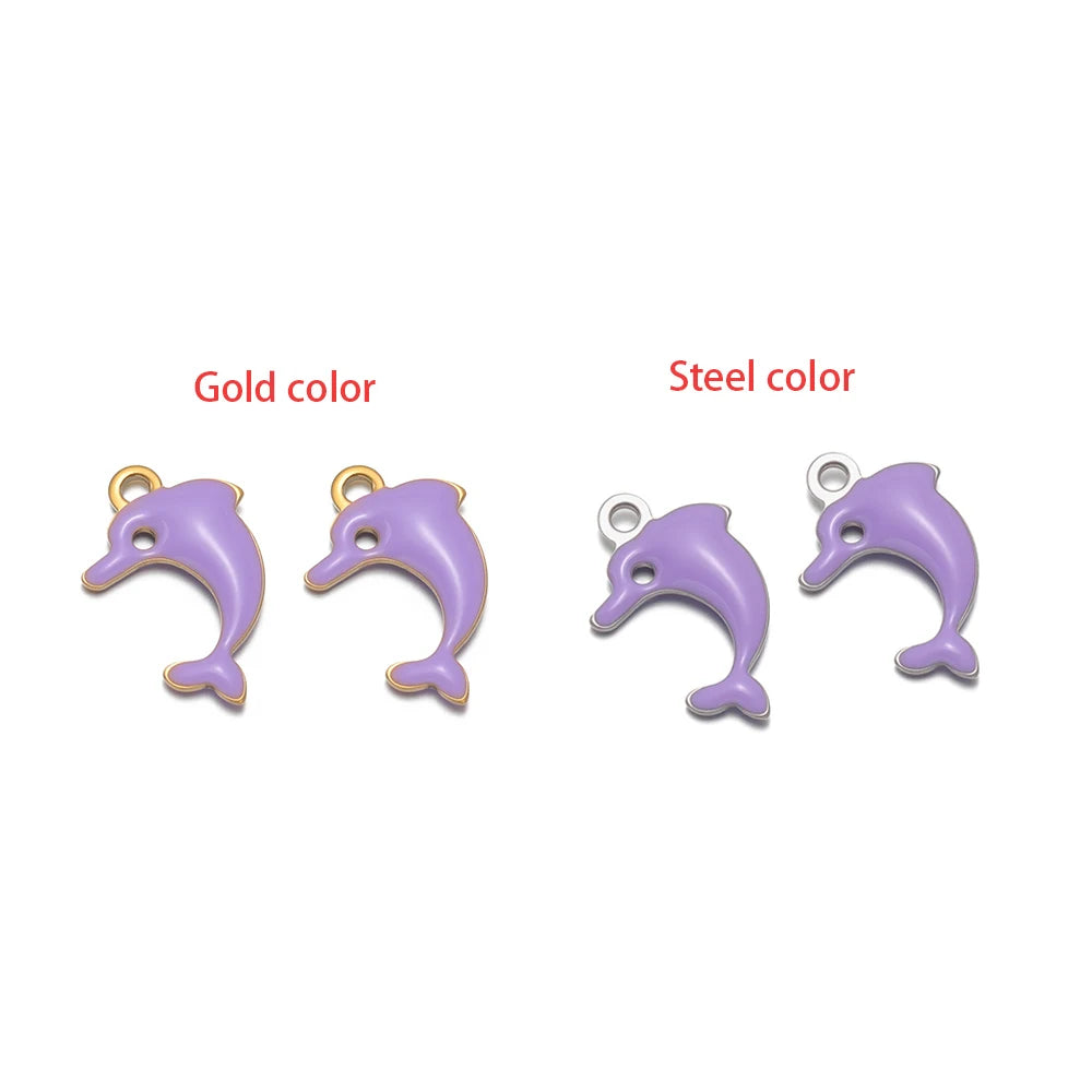 Purple dolphin pendant charm with gold-tone loop, marine animal jewelry finding
