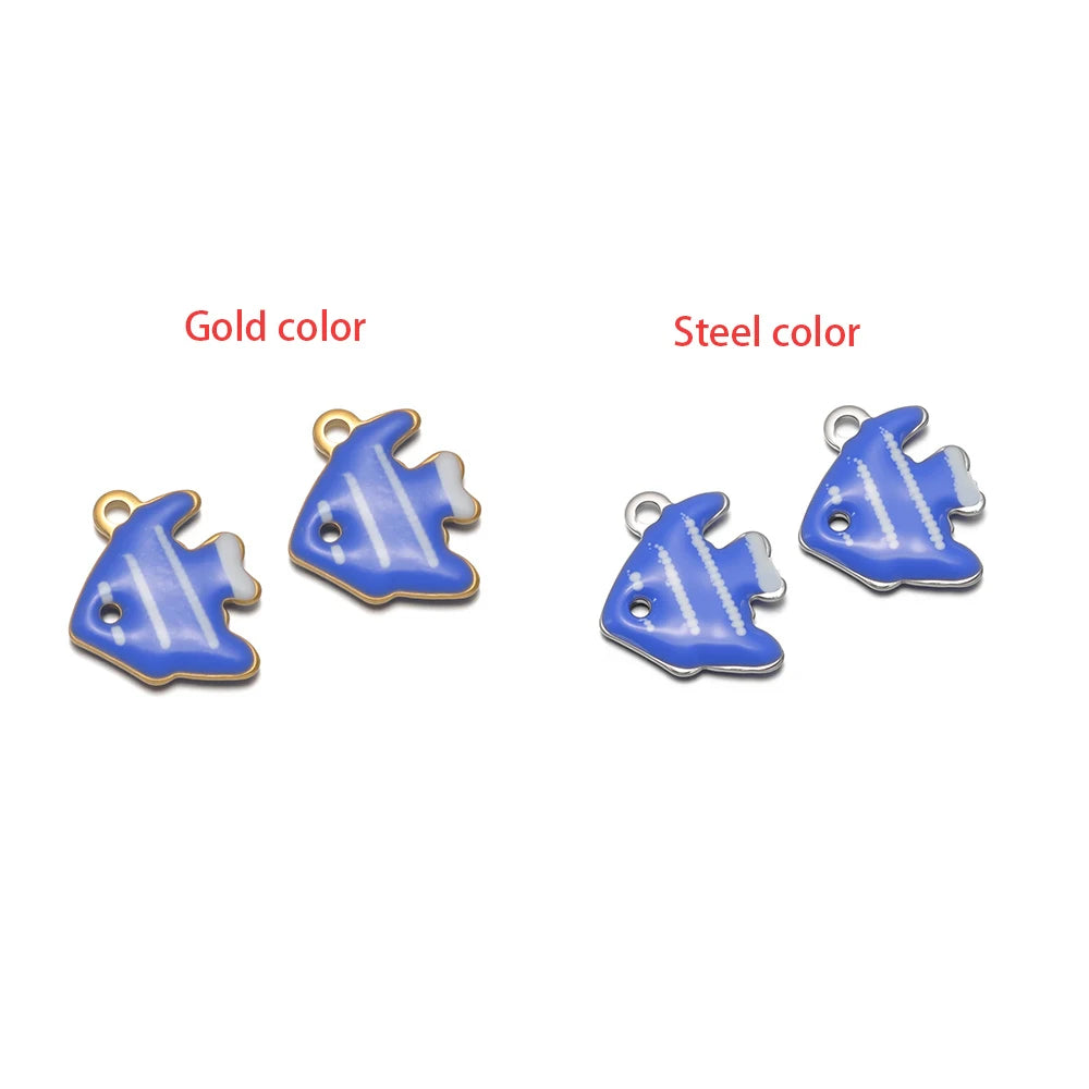 Blue dolphin-shaped charm set with loop, gold-tone and silver-tone finishes.