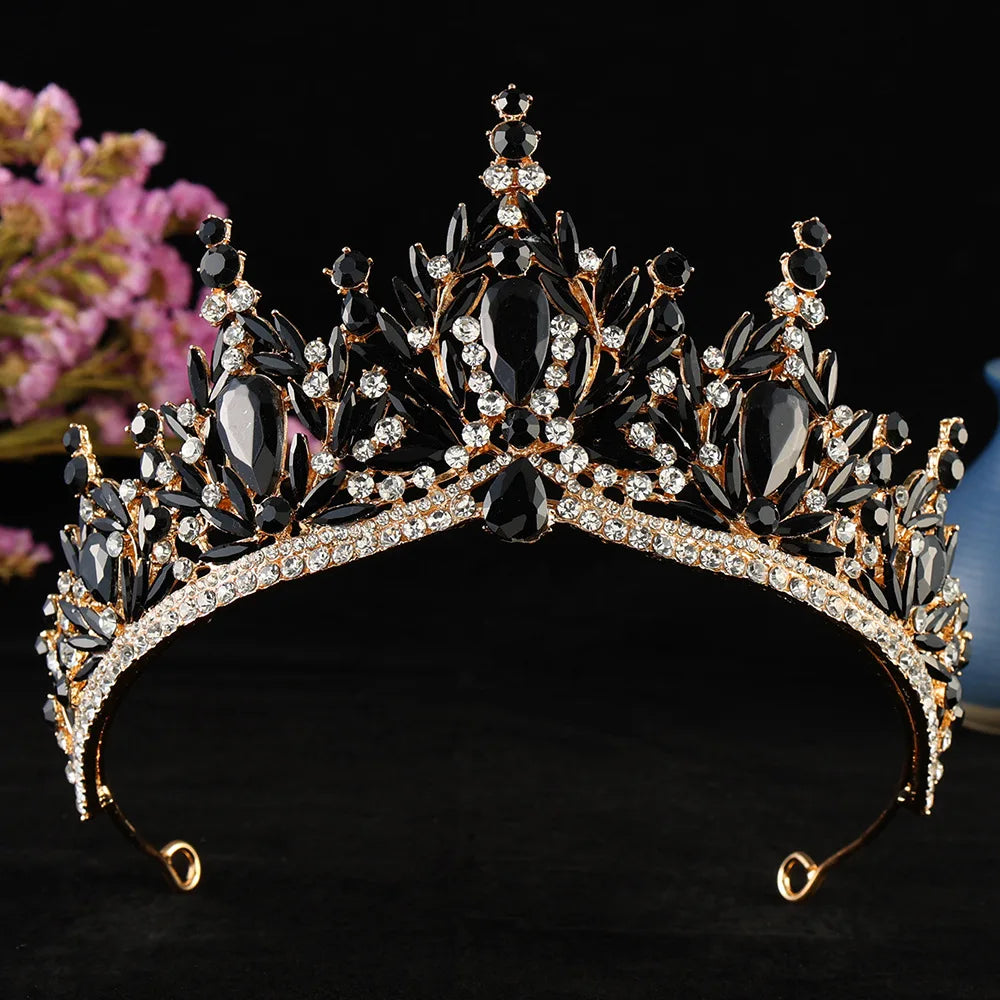 Black and silver crystal tiara with dark gemstones, faceted accents, and crown top