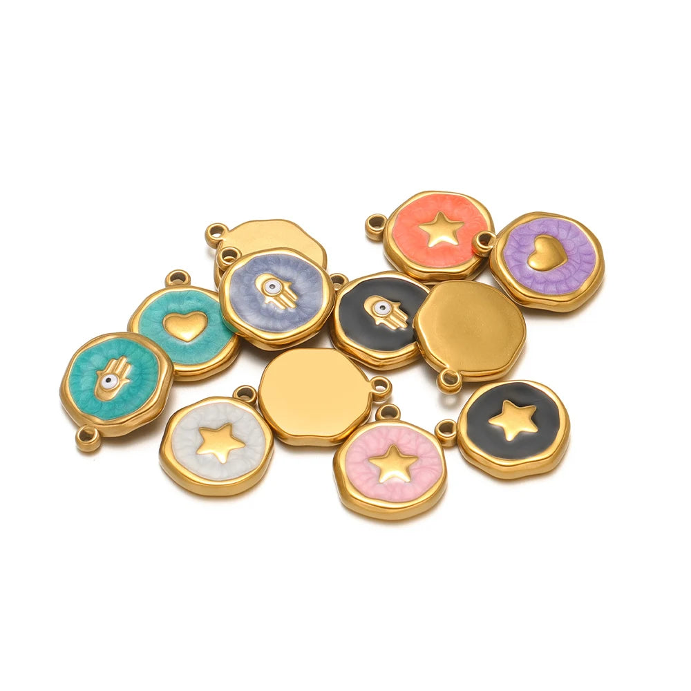 Assorted gold-tone enamel evil eye and star pendants, mixed pastel colors