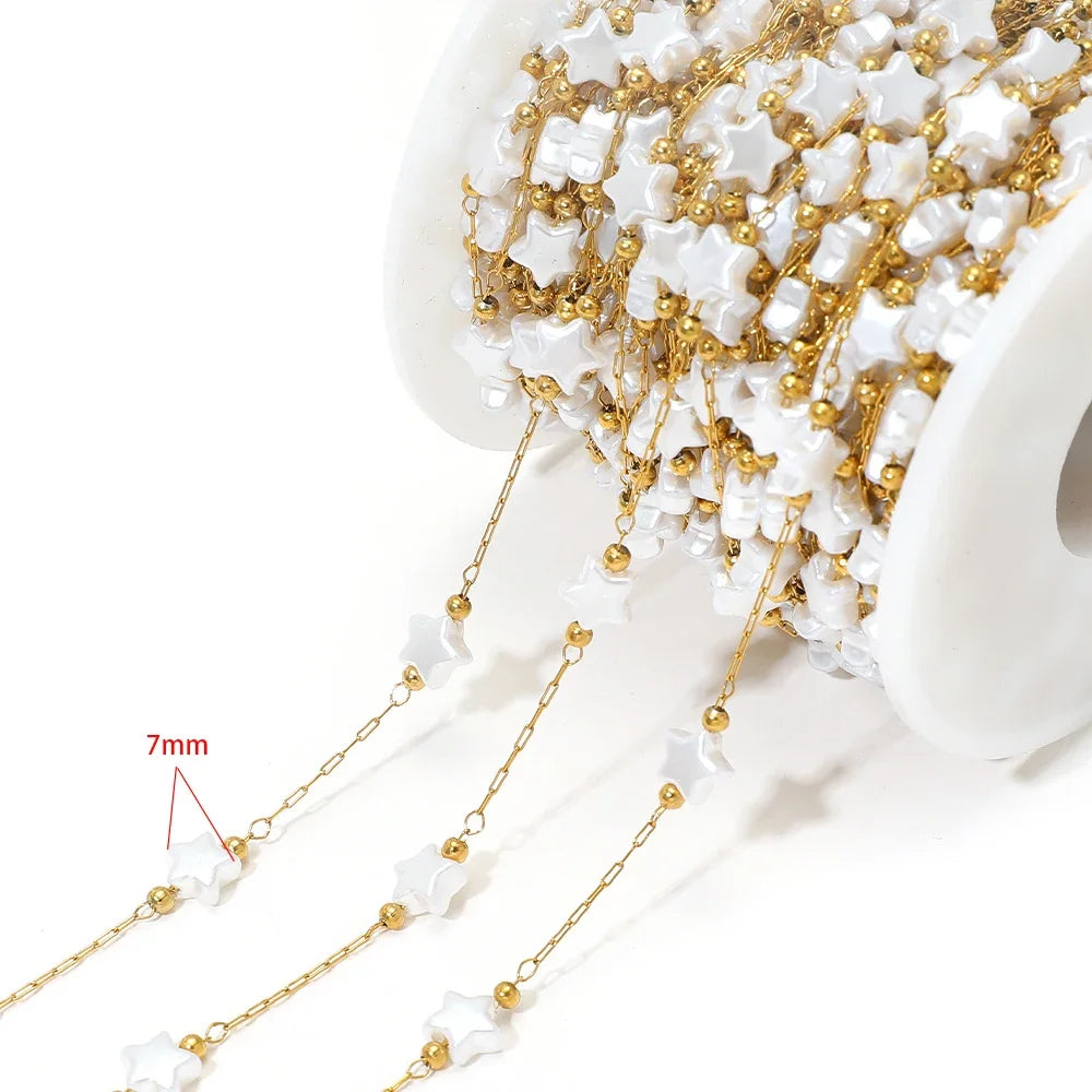 Gold-tone chain with white artificial pearl flower charms, 7mm size shown