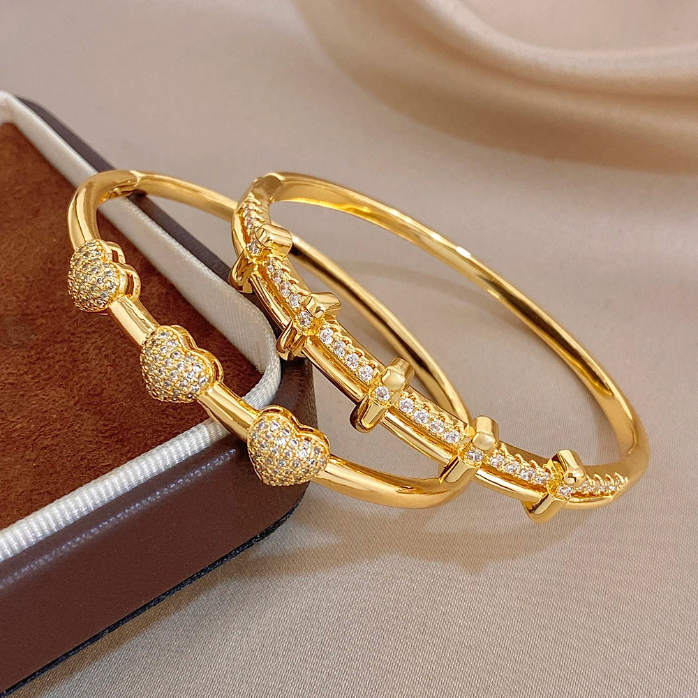 Gold-tone zircon geometric cuff bangle with raised pave links, stacked pair