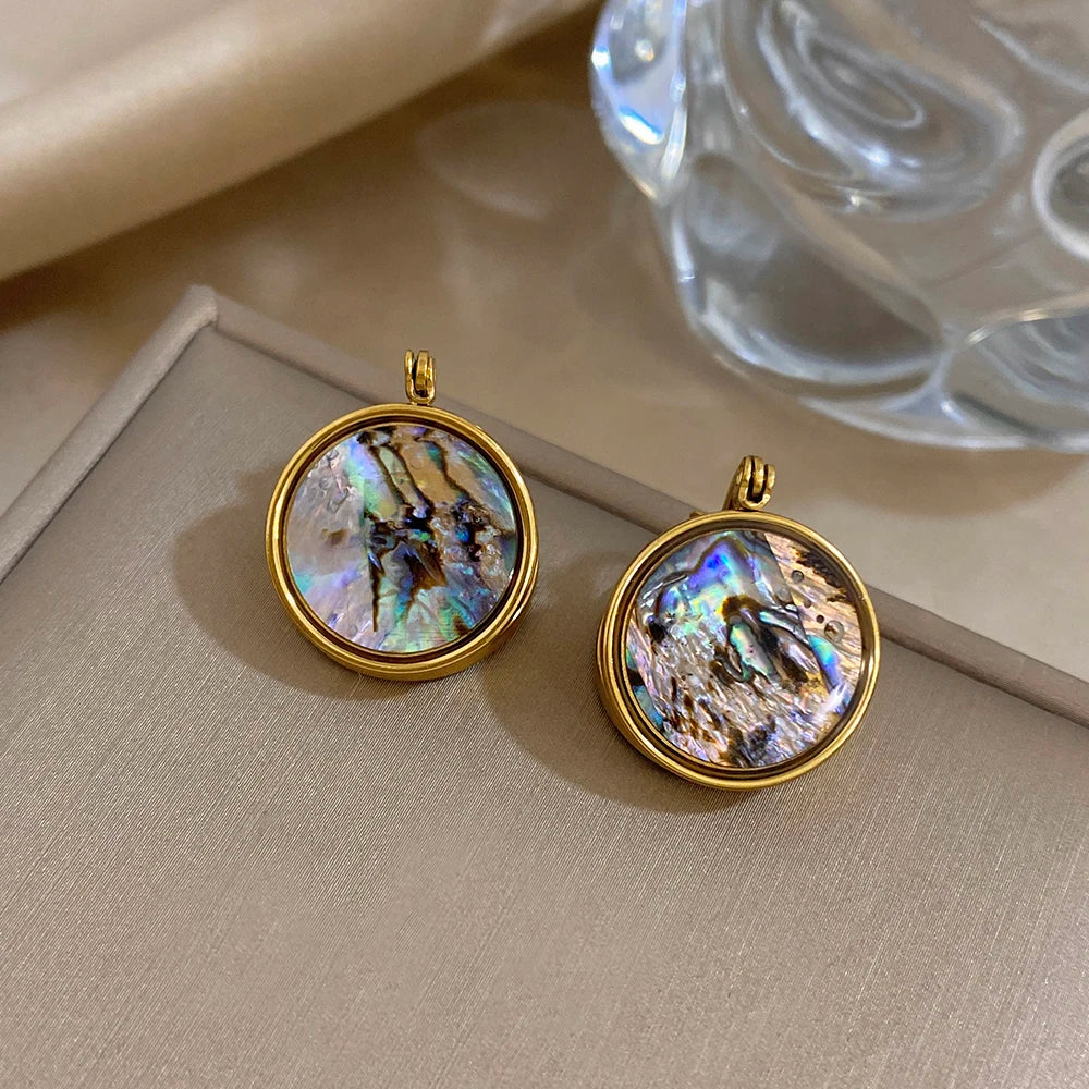 Gold-plated round abalone shell hoop earrings with shimmering iridescent discs