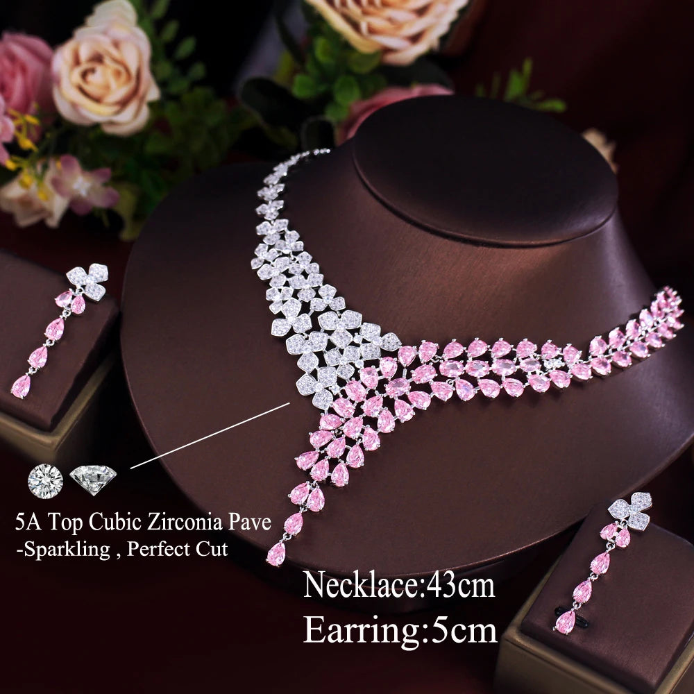Bridal jewelry set with pink and clear stones; necklace and earring lengths shown