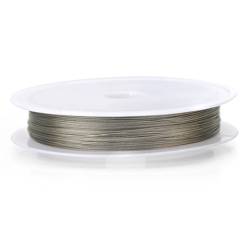 Steel stainless steel beading wire cord on a single white spool