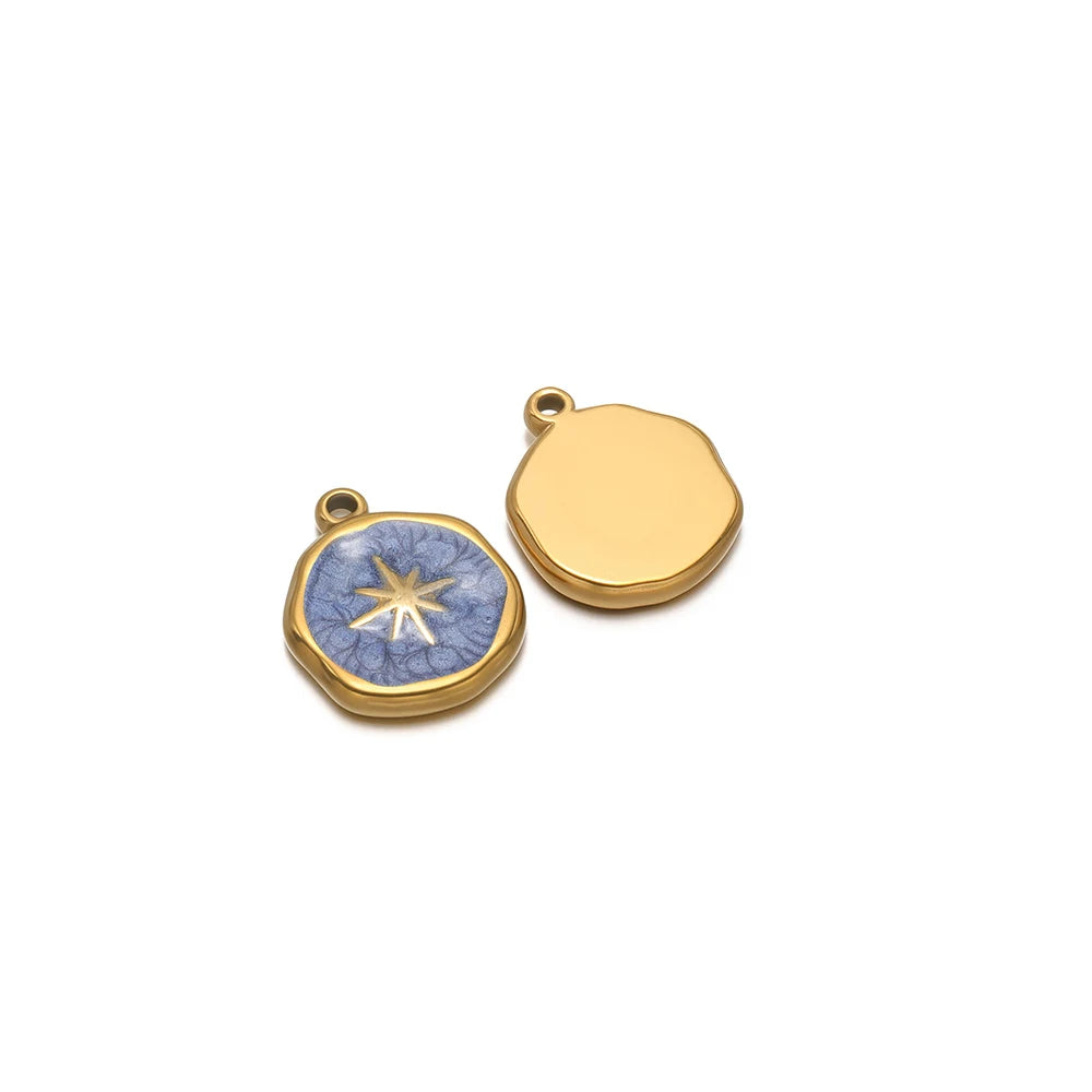 Gold-tone round charm with blue star enamel, plus blank gold-tone round charm