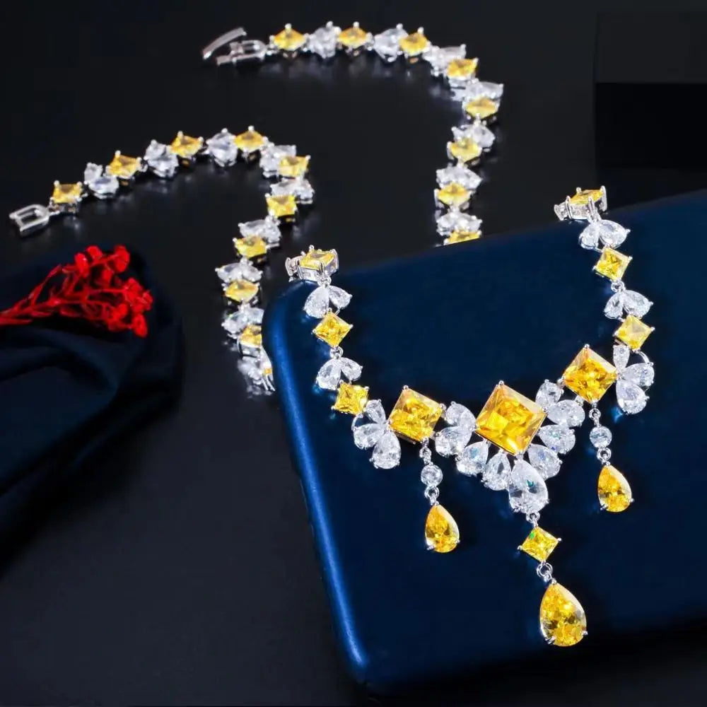 Cubic zirconia necklace and earrings with alternating yellow and clear stones
