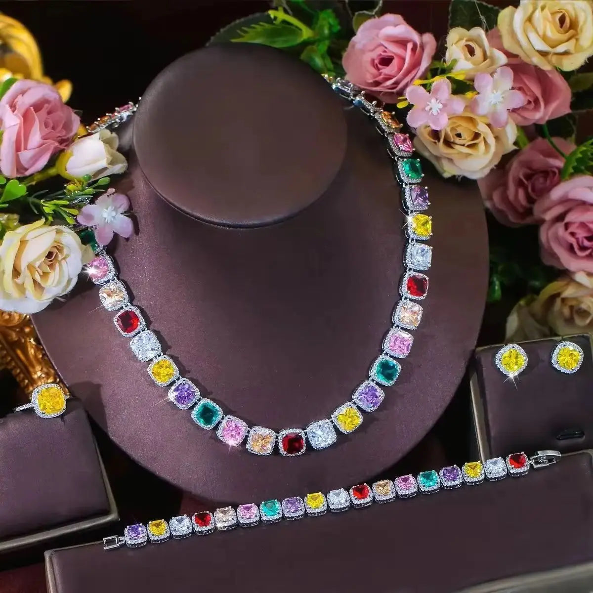 Multicolor CZ necklace and bracelet set with round stud earrings, silver-tone display