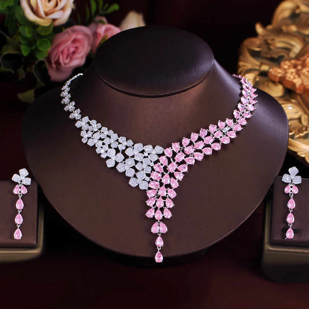 Bridal jewelry set with a pink and clear cubic zirconia necklace and drop earrings