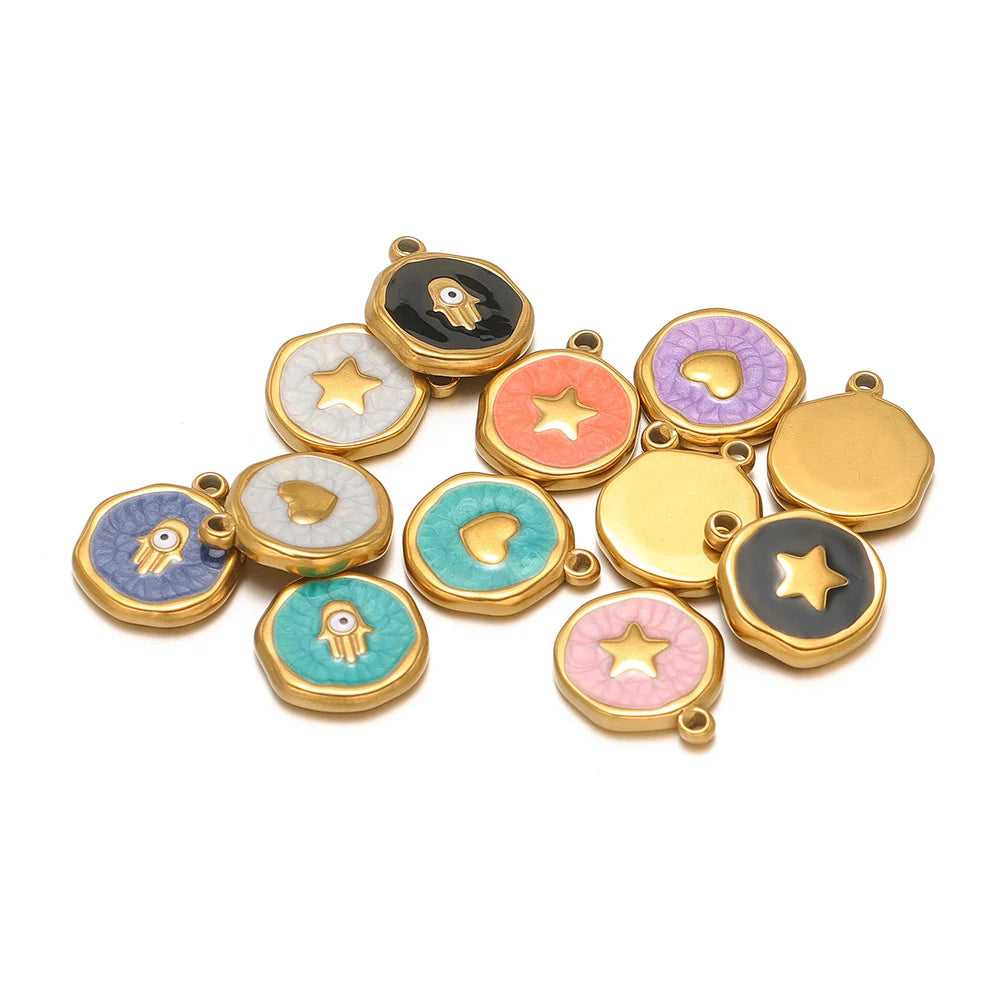 Mixed gold-tone enamel pendants with evil eye, star, heart, and hand motifs