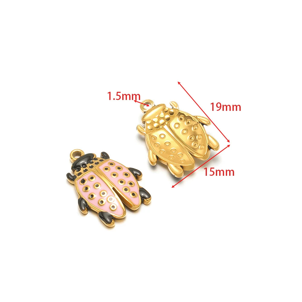 Gold and pink enamel beetle charm pendant with black wing detail