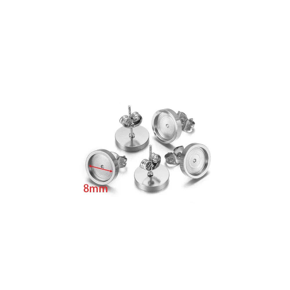 Steel-tone round stud earring bases, 8mm size marking visible, with posts and backs
